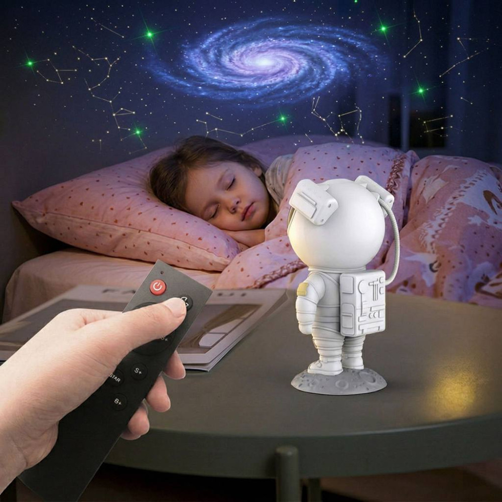 Лазерный ночник-проектор звездного неба. Астронавт с пультом.